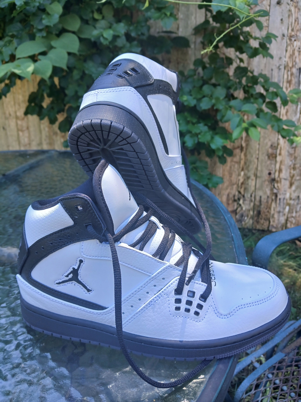 Jordan Men’s White and Black Mid-Top Sneakers with Jumpman Logo